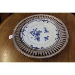 AN 18TH CENTURY CHINESE HAND PAINTED FLORAL BLUE AND WHITE PLATE housed within an associated