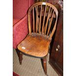 A PROBABLE 19TH CENTURY HOOP & STICK BACK SOLID SEATED CHAIR with old metal fixings