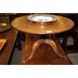 A 19TH CENTURY MAHOGANY CIRCULAR TOPPED TABLE on canon barrel cut down column, and three downswept