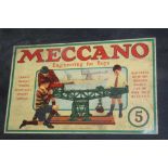 A SHELF CONTAINING A LARGE COLLECTION OF VINTAGE AND ORIGINAL MECCANO