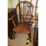 A 19TH CENTURY WHEEL BACKED COUNTRY KITCHEN ARMCHAIR