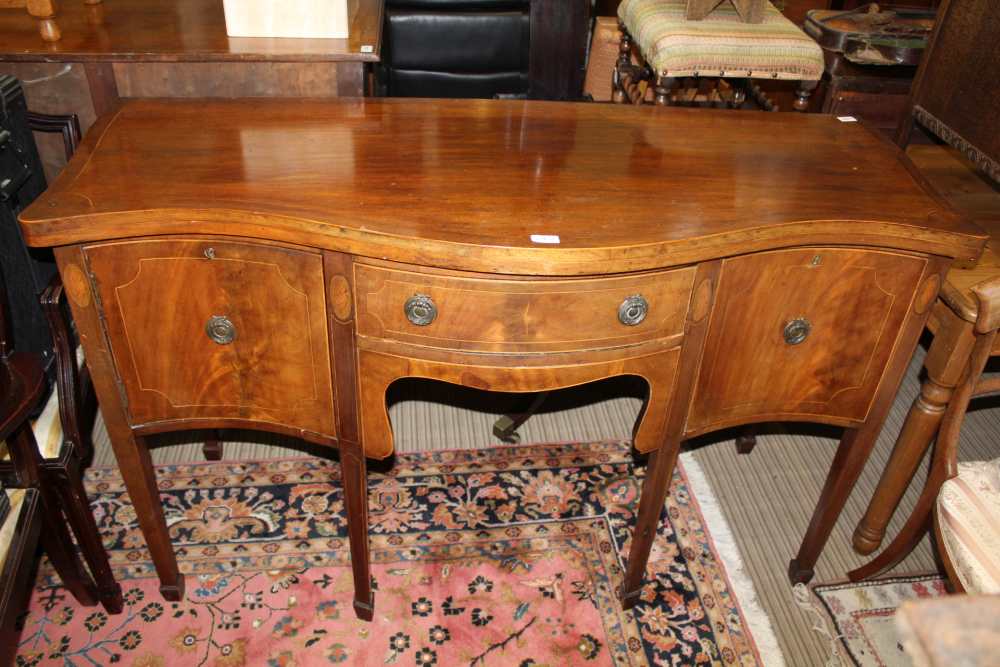 A 19TH CENTURY MAHOGANY SERPENTINE FRONTED SIDEBOARD with decorative inlaid drawers and single