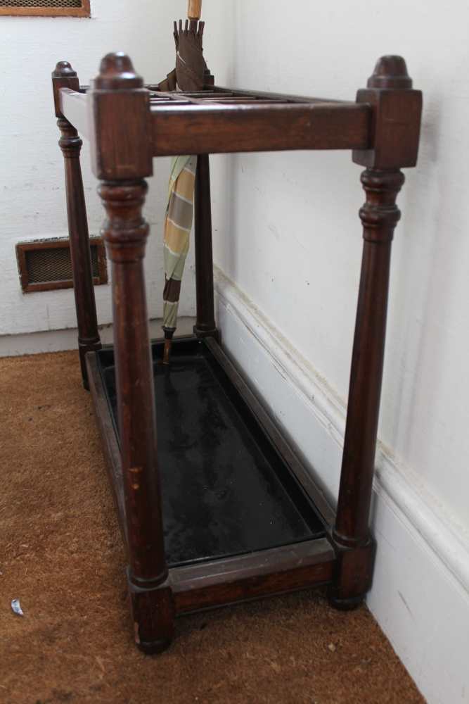 A FIRST-QUARTER 20TH CENTURY MAHOGANY FINISHED STICK STAND with multi-aperture top, supported on - Image 2 of 2