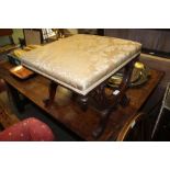 A 19TH CENTURY MAHOGANY SQUARE PAD TOPPED STOOL on twin carved 'X' shaped sides, united by a