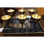 A 20TH CENTURY JAPANESE LACQUER SAKI SET, comprising tray 30cm x 21cm, black ground with gilded