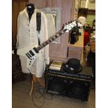 AN INSTANT 'ROCK GOD/ GODDESS' KIT comprising white finished flying V Guitar by 'Gould' with a