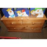 A LOW MODERN PINE THREE DRAWER CHEST