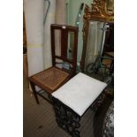 A METAL TROLLEY, together with A RECTANGULAR PAD TOPPED STOOL on black finished ironwork frame,