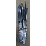 A SET OF SEVEN LATE 19TH CENTURY FRENCH DINNER KNIVES, plated acanthus leaf moulded handles, the