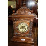 A LATE 19TH CENTURY SOFTWOOD CASED MANTEL CLOCK