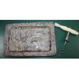 AN ORIENTAL PRESSED METAL TRAY in the form of two storks amongst the bamboo, together with a