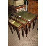 A REPRODUCTION NEST OF THREE TABLES supported on slender reeded legs