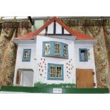 A MID 20TH CENTURY DOLL'S HOUSE