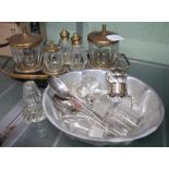 A MID-CENTURY TABLE TOP CRUET together with a selection of silver collared bottles and a food mould