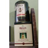 TWO BOXED BELL'S SCOTCH WHISKY CHRISTMAS COMMEMORATIVE DECANTERS, plus contents