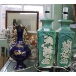 A PAIR OF GREEN GLAZED ORIENTAL VASE BASED TABLE LAMPS together with another converted lamp, a