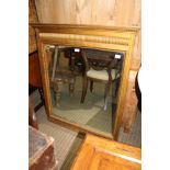 A GILT FRAMED RECTANGULAR PLAIN PLATE OVER MANTEL MIRROR