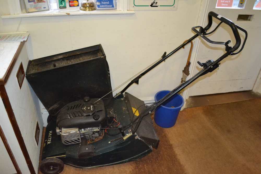 A HAYTER BRANDED PETROL DRIVEN LAWN MOWER with grass collection box, powered by a Briggs &