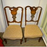 A PAIR OF FANCY INLAID BACKED LOW CHAIRS with overstuffed seat pads, on cabriole fore legs and plain