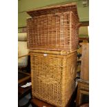 TWO LARGE USEFUL WOVEN WICKER BASKETS, one containing a selection of domestic copper wares