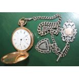A GOLD PLATED POCKET WATCH together with a probable silver Albert with two shield fobs