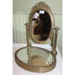 A PRESSED BRASS EFFECT FRAMED DRESSING TABLE TOP TIDY with mirror back