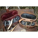 A LEATHER CASED PAIR OF CARL ZEISS BINOCULARS together with a probable military pair of cased