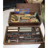 A SOFTWOOD BOX CONTAINING A HORNBY TRAIN SET