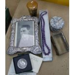 A BAG CONTAINING A PROBABLE HALLMARKED SILVER PHOTOGRAPH FRAME, various trinket pots etc.