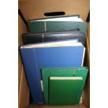 A BOX CONTAINING A SELECTION OF STAMP STOCK BOOKS the majority GB & The Commonwealth