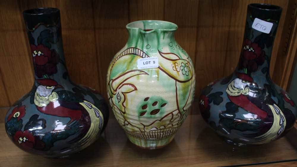 A PAIR OF LARGE DECORO BOTTLE VASES, together with a rustic terracotta jug, decorated with a