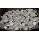 A BOX CONTAINING A LARGE SELECTION OF CRESTED CHINA, the majority Goss three-handled tygs