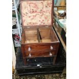 A USEFUL BLACK PAINTED TIN TRUNK together with a mahogany storage table, with lift-up lid and