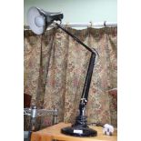 A BLACK FINISHED ANGLEPOISE LAMP