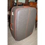 A MULBERRY BRANDED LARGE SIZED HARD SHELL SUITCASE