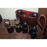 THREE PAIRS OF VINTAGE BINOCULARS, one cased