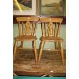 A SET OF SIX MODERN BEECH WOOD SPINDLE BACK SOLID SEATED KITCHEN CHAIRS