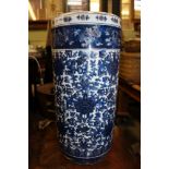 A HAND PAINTED POTTERY ORIENTAL CYLINDRICAL STICK STAND