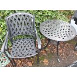 A LATTICE DECORATED GARDEN TABLE & TWO ARMCHAIRS