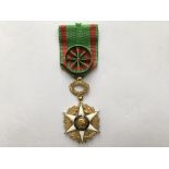 An 1885 French Republic Order of Agricultural Merit medal.