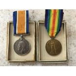 A First World War medal group of two awarded to E. Godfrey to include War Medal and Victory Medal