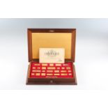 A sterling silver replica set of “The Stamps of a Royalty” with 25 stamp plates in total.