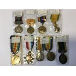 A group of nine medals to include a General Service medal awarded to SGT. D. Ronnie and various