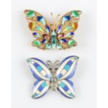 A filigree butterfly brooch, with multi-coloured enamel to body, stamped silver, together with