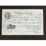 A Bank of England white five pound note dated March 26 1955, London.