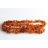 A string of tumbled amber beads.