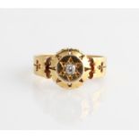 A Victorian 18ct yellow gold diamond ring, star set with a central old mine cut diamond, measuring