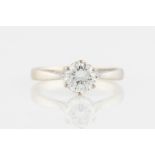 A diamond solitaire ring, set with a round brilliant cut diamond, measuring approx. 0.80ct, with