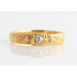 A Victorian 22ct yellow gold diamond solitaire ring, set with a central old cut diamond, measuring