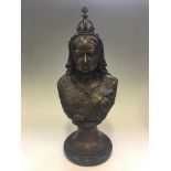 A bronze sculpture of Queen Victoria, on marble base, height approximately 41cm.
